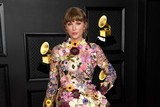 thumbnail: Taylor Swift in Oscar de la Renta. Schoenen van Louboutin