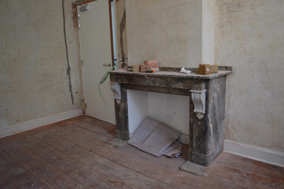 A marble mantelpiece in the rectory.  The chimney on the roof itself is gone. 