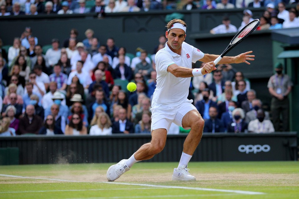 Roger Federer tijdens zijn laatste Wimbledon, met Uniqlo-kledij en zijn eigen ‘Roger’-schoenen. 