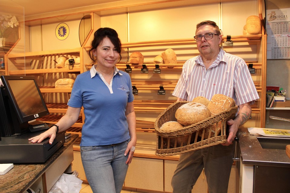 Malgosia Szymandera en Richard Verbeeck in hun winkel.