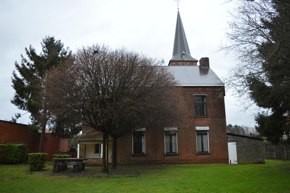 De tuin aan de achterzijde van de pastorie.