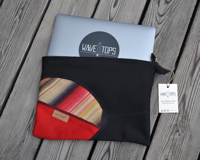 The wetsuits get a second life as a laptop sleeve or wallet. 