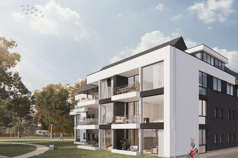 Een uitzicht van het kant-en-klare gebouw aan de Stationsstraat. Links het park Brouwershof en achteraan de Schoolweg en de bibliotheek.
