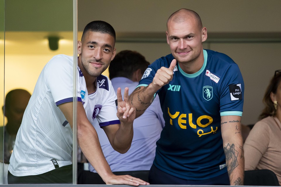 Tissoudali en Prychynenko als supporters op het Kiel.