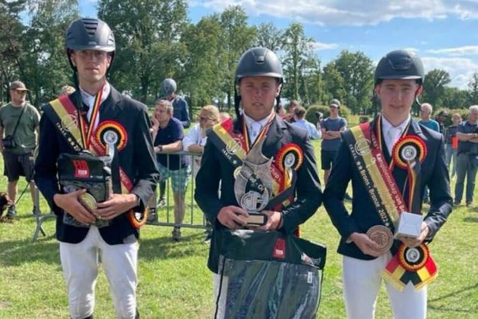 Robbe Verelst (centraal) is Belgisch kampioen.