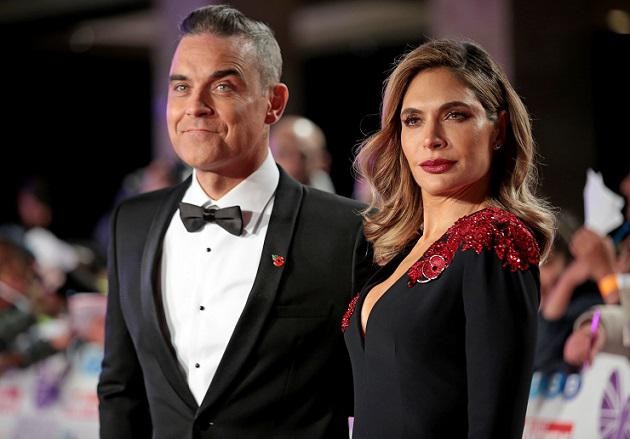 Robbie Williams en zijn echtgenote Ayda Field. 