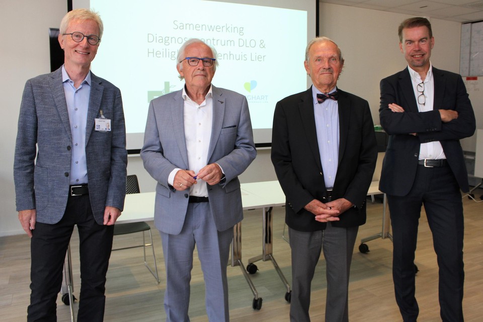 Peter Degadt, Chris Van Opstal, Erik Cornelis en onderhandelaar Geert Wellens. 