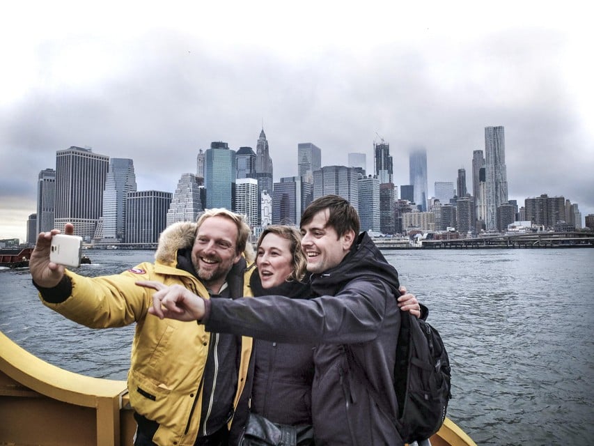 Patrick Van Rosendaal with some tourists on the Hudson River in New York. 