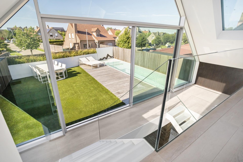 Next steps lead you to the sun-drenched rooftop terrace and heated swimming pool.
