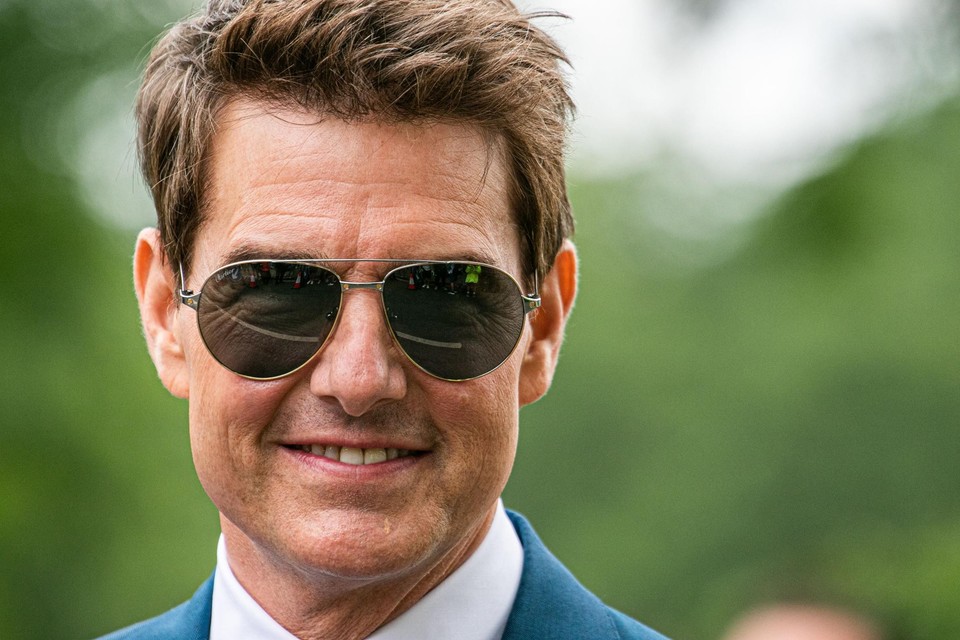 Tom Cruise in juli, tijdens het tennistoernooi van Wimbledon, toen zijn gezicht er nog niet zo vol uitzag als nu.