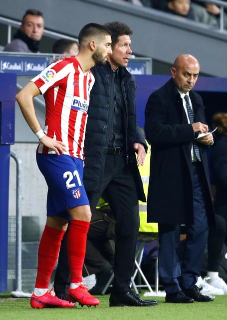Carrasco en coach Diego Simeone.
